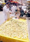 Quetta  Man sells seasonal fruit at his push-cart to earn his  livelihood
