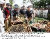 Capital City Police Officer (CCPO), Ghulam Shabbir  Sheikh puts floral wreaths at coffins of police
