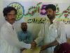 Next picture :: Me.. Geting Certificate of best performance in teaching at Salaam Teacher Day. Distt: Kachhi
