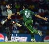 Next picture :: Umar Gul exults after picking up Brendon McCullum