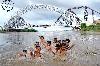 Next picture :: SUKKUR: Children enjoying bathing near Lance Rohri Bridge.