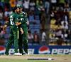 Previous picture :: Shahid Afridi is congratulated by Shoaib Malik